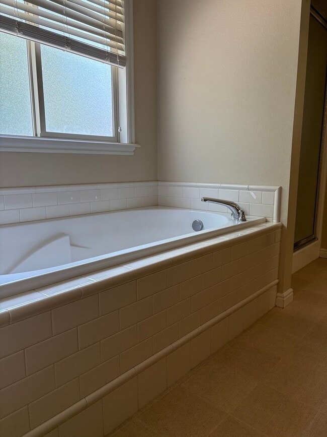 Building Photo - "Luxury Living: Stunning home with marble counter tops & Fireplace!"