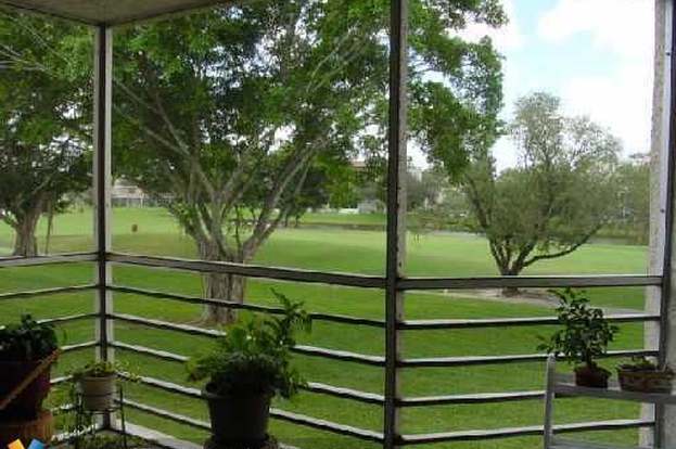 Building Photo - 1831 Sabal Palm Dr