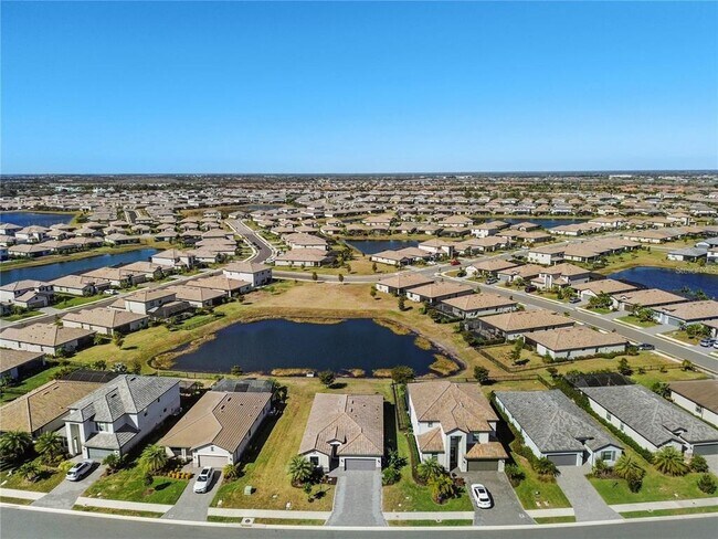 Building Photo - 15719 Islandwalk Ave