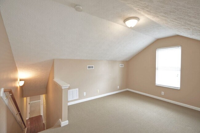 Building Photo - Former model home in highly sought after B...