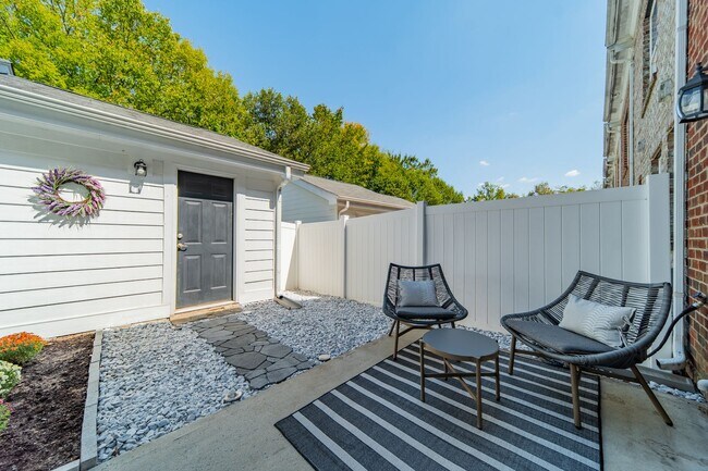 Building Photo - UPGRADES! Two Bedroom Townhouse - Six Mont...