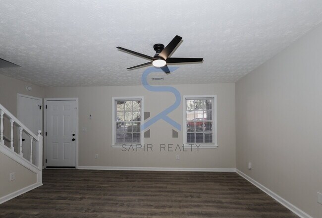 Building Photo - Move in before December 15th and choose your reward: a $250 Amazon Gift Card or a 55" Smart TV!