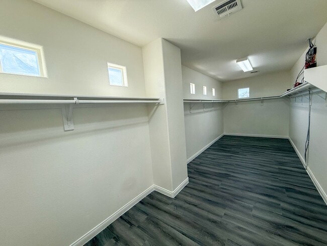 Building Photo - SPACIOUS HOME IN GATED COMMUNITY WITH POOL, RV PARKING & 4-CAR GARAGE!