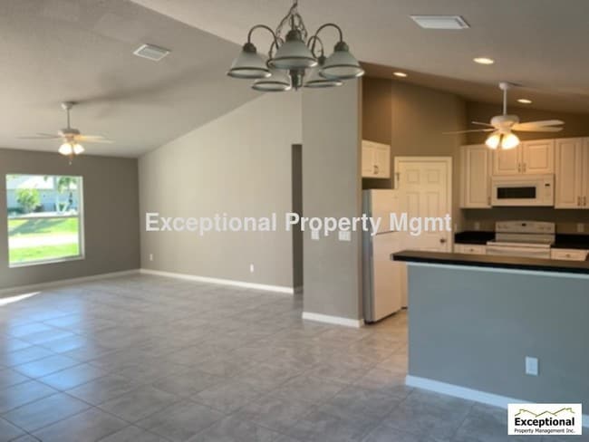 Building Photo - Move-In Ready 4 Bedroom Home SE Cape! Zero Carpet.