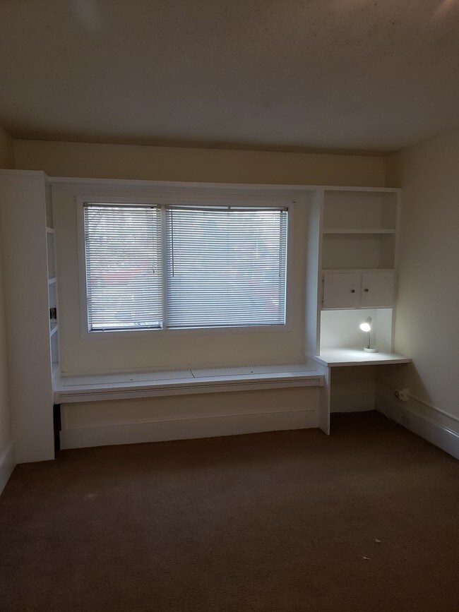 bedroom with built-in's - 4411 Kaplan Dr