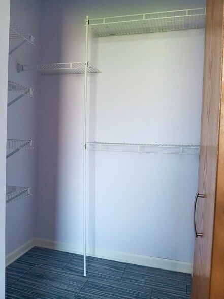 Walk-in closet in bedroom - 1425 W 28th St