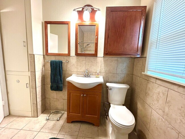 Building Photo - *MOVE IN SPECIAL* Stylishly Renovated Home with Fenced Backyard & Two Living Areas!