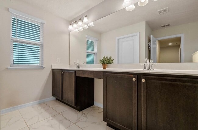 Building Photo - Water Front Home- 4 Large Bedrooms-3 baths Gated Community Call Sheila Campbell 407-687-7900