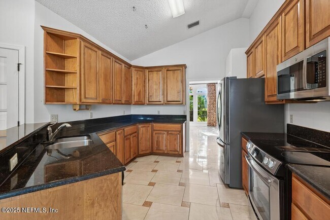 Building Photo - 4851 Jaybird Cir N