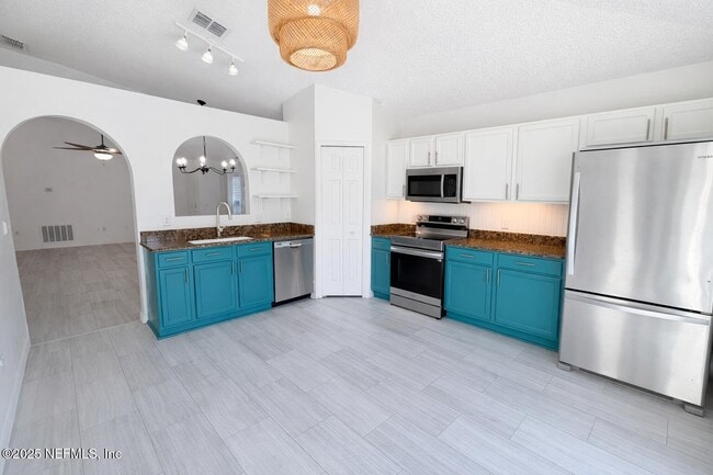 Building Photo - 6634 Gentle Oaks Dr W