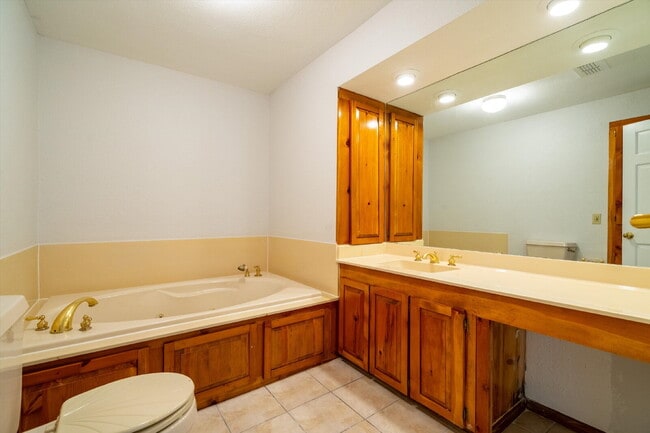 Building Photo - Move in special: $1,000 off your first month with an 18 month lease.