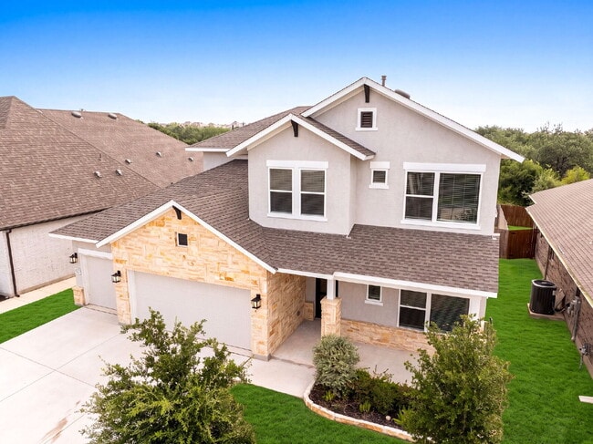 Building Photo - Greenbelt. 3 Car Garage. Built In Dog Room.