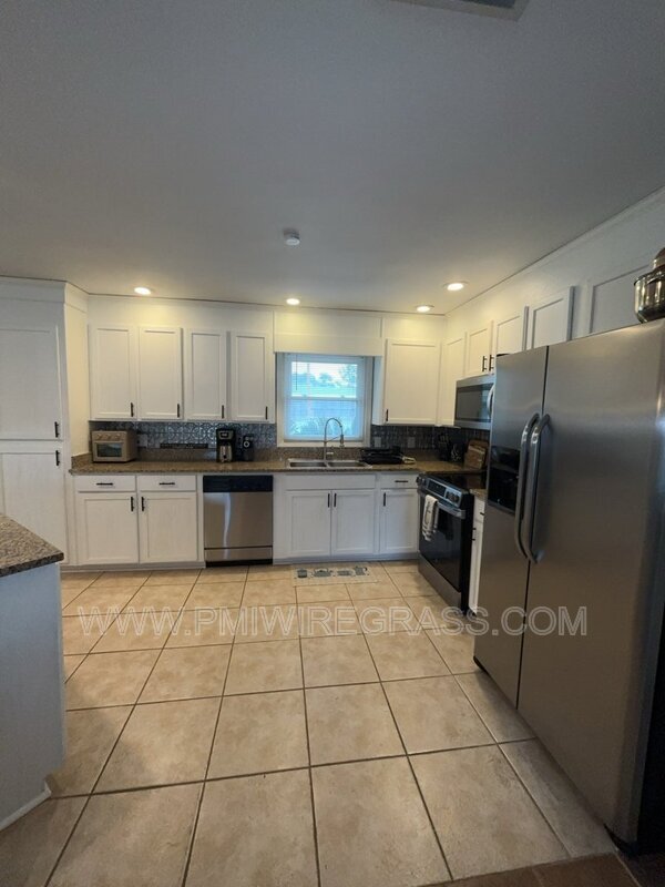 Building Photo - 202 Pondella Dr