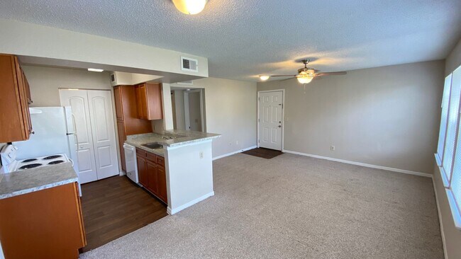 Building Photo - MOVE IN SPECIAL! First Floor 2BR/2BA Condo...