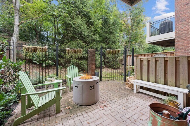 Building Photo - Discover this stunning four-level townhous...