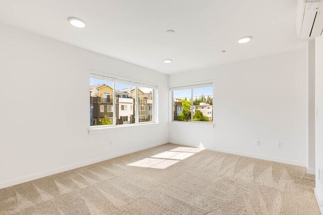 Building Photo - Modern Townhome in Upton at Crossroads Village – Stylish Living in a Prime Location