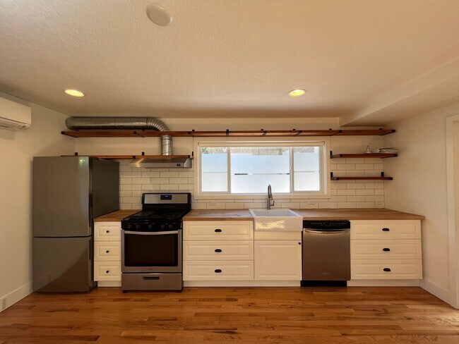 Building Photo - Custom Built 1Bd/ 1Ba home in Piedmont Neighborhood! ~ Skylight, Driveway Parking, Washer/Dryer! ...