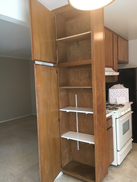 Kitchen pantry cabinet - 18630 Del Rio Pl