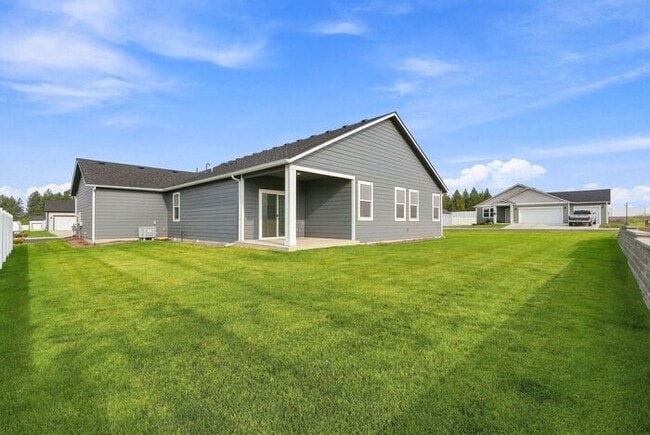Building Photo - Modern 4-Bedroom Home with a 3-Car Garage & Covered Patio