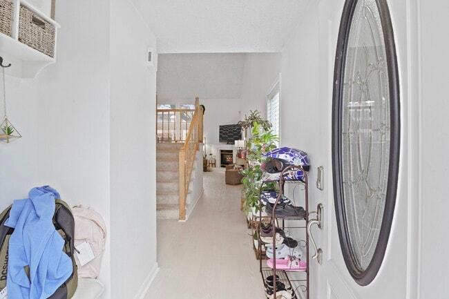 Entry, stairs, living room view - 12204 SE 7th St