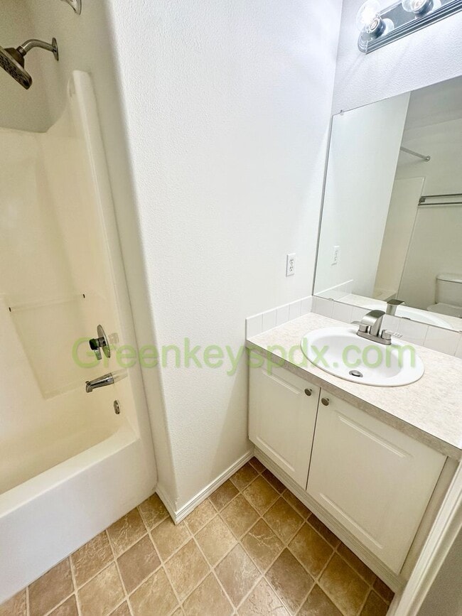 Building Photo - Amazing 2-Bedroom Townhouse with 2.5 Bathrooms, Attached Garage, Private Fenced Patio