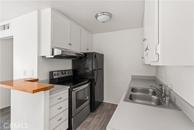 Building Photo - 576 N Bellflower Blvd