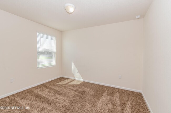 Building Photo - 15697 Saddled Charger Dr