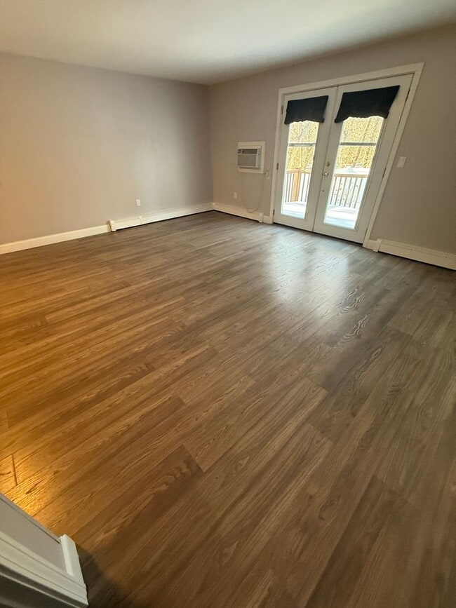 Building Photo - A two bedroom, 1 and a half bath unit in Townhouse. Unit 11-$2,800 per month plus utilities