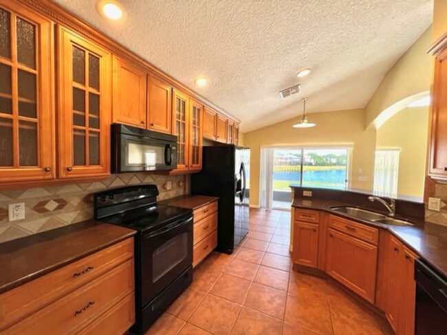 Building Photo - EAGLE CREEK LAKE NONA! WELCOME HOME! Beautiful water views! Spacious 2 story-3 bedroom 2.5 bath h...