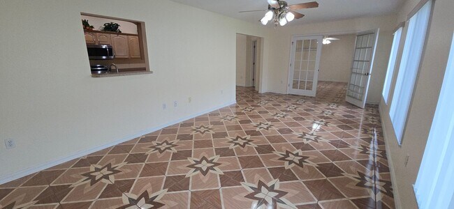 Building Photo - Move-In Ready 2BR/2BA Home with Solar & Bo...
