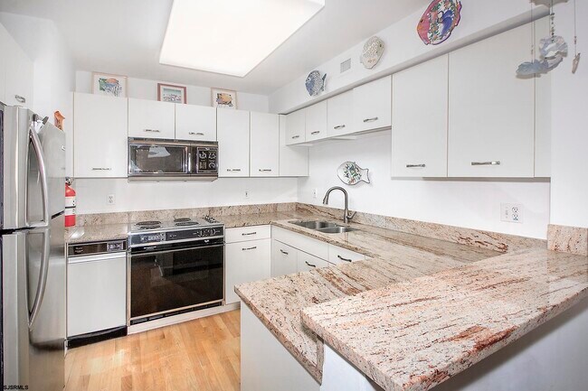 Building Photo - 7701 Atlantic Ave