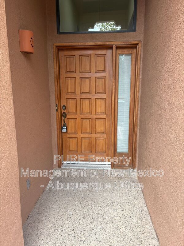 Building Photo - 8220 W Raintree Dr NE