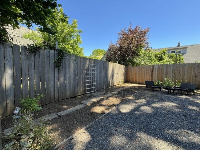 Building Photo - Charming Cottage with Hardwood Flooring, Modern Kitchen & Beautiful Outdoor Living Areas