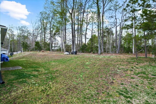 Building Photo - For Rent: Modern 4-Bedroom Home with Priva...