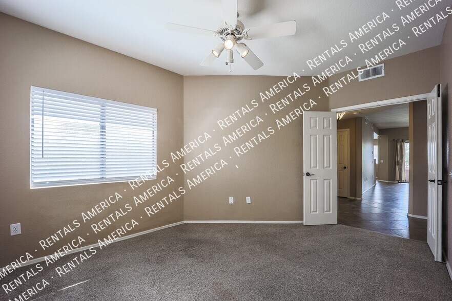 Building Photo - 9555 E Raintree Dr