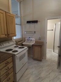 Building Photo - Tivolli Building Apartments        MDB