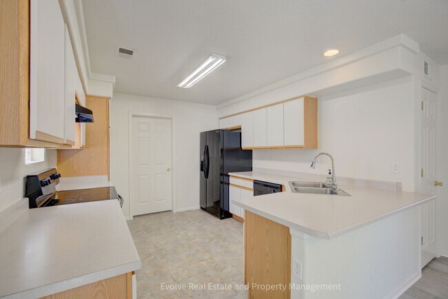 Building Photo - Evolve Real Estate: Bright & Spacious Home in Denver’s Green Valley Ranch! Available May 1st