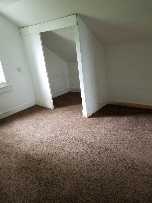 Upstairs Bedroom #1, east wall with closet. - 15 Goodrich St