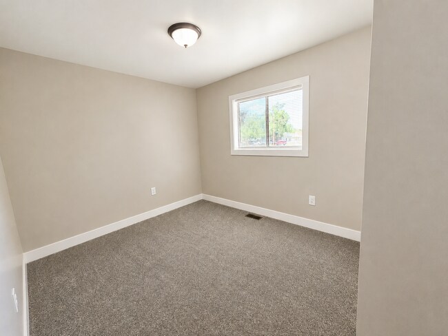 Building Photo - Spacious 4-Bedroom, 2-Bath Home with Updated Interior