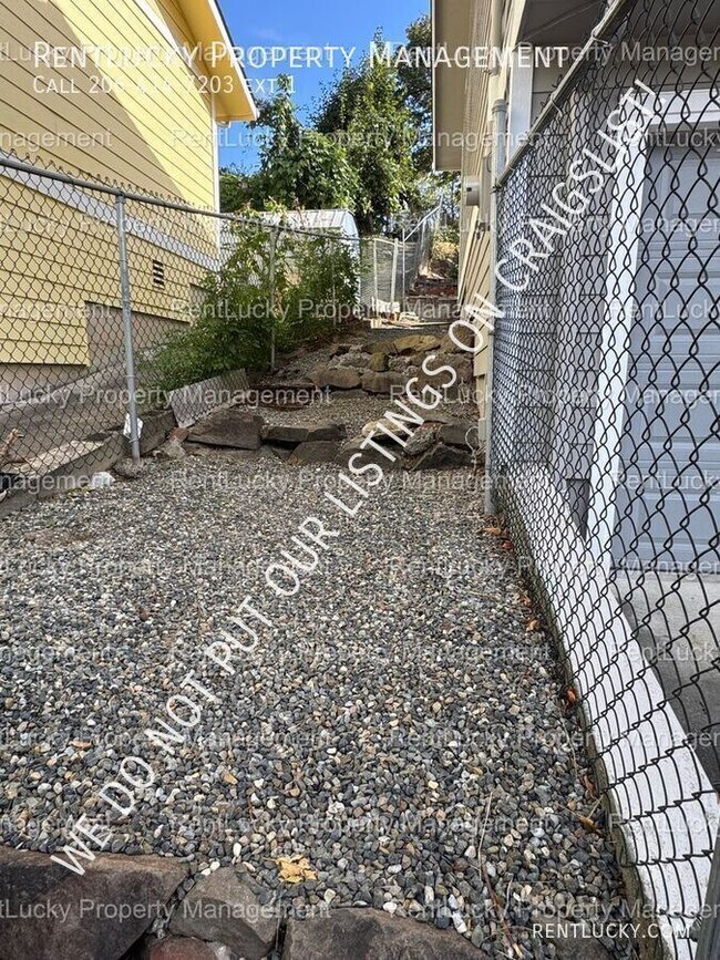 Building Photo - 6718 23rd Ave SW