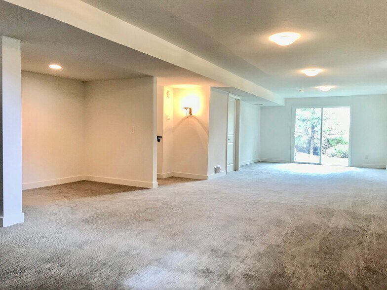 2nd Family room in the basement with walk out to backyard. - 3360 ward road