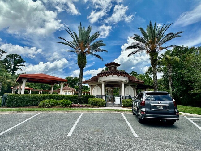 Building Photo - Gated Community! Walking Distance to the B...