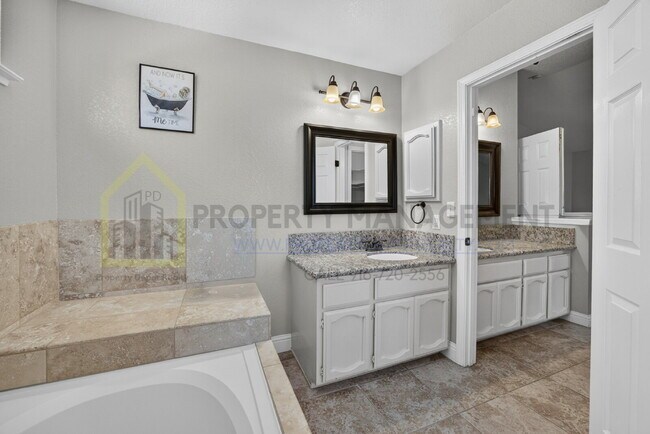 Building Photo - Spacious 4-Bedroom Retreat with 2.5 Baths