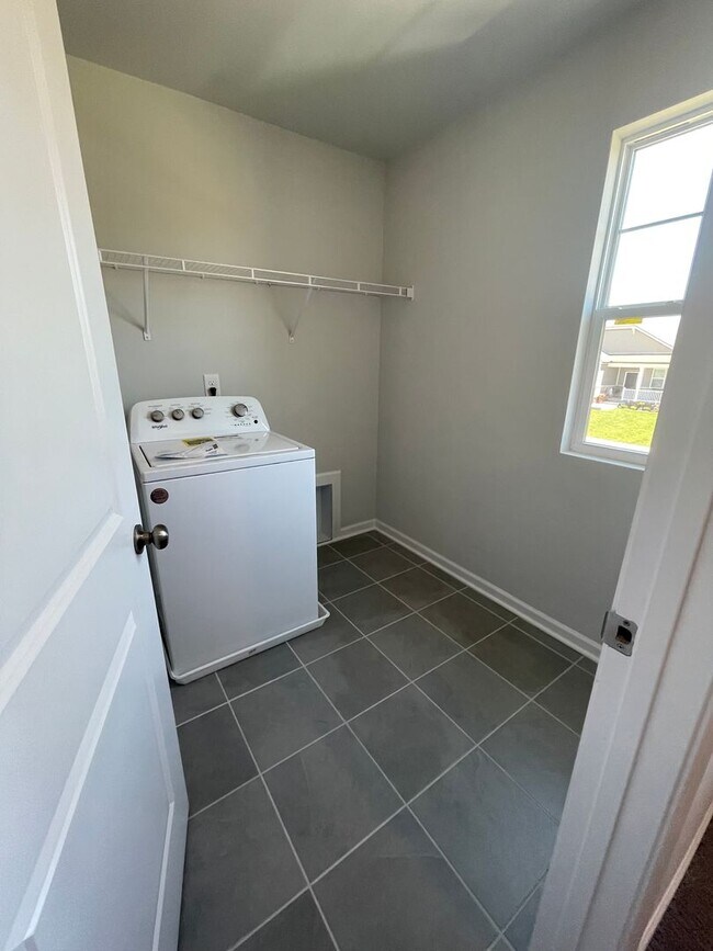 Building Photo - Introducing a stunning home