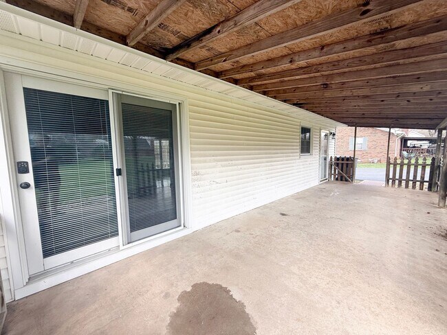 Building Photo - Spacious 3-Bedroom Home with Huge Yard, Covered Porches & Storage Building