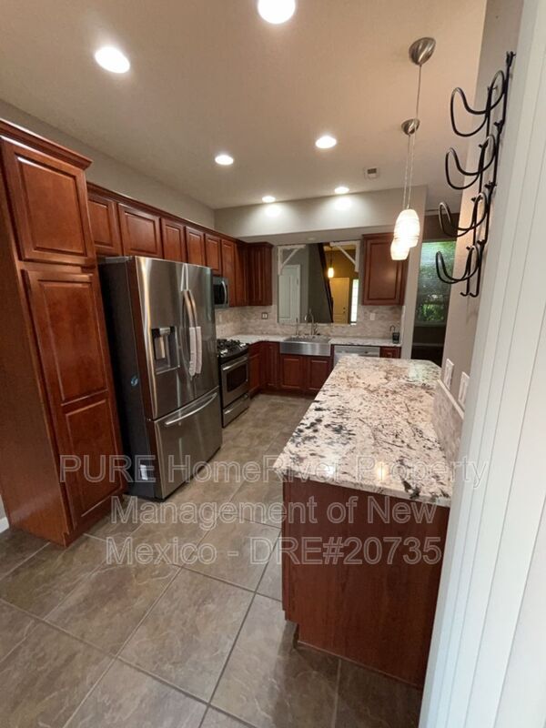 Building Photo - 10115 Avenida Vista Cerros NW