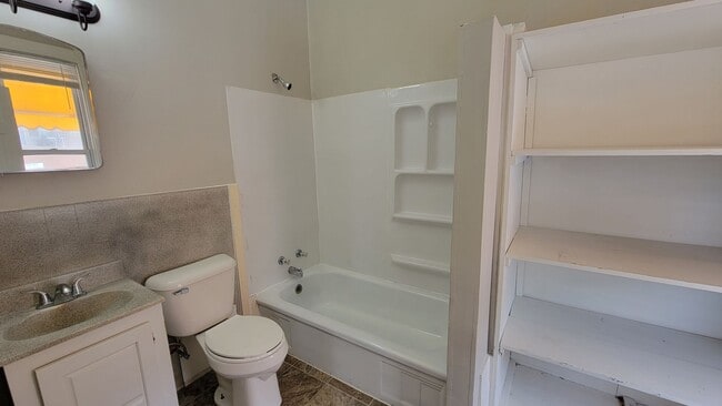 Building Photo - Vibrant Studio & 1-Bedroom Apartments in the Sought-After Whittier Neighborhood