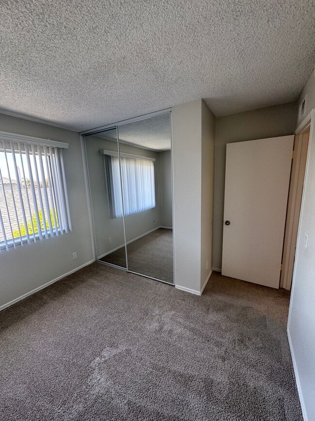 Building Photo - COMING SOON! 3 Bed + 1.5 Bath Townhouse