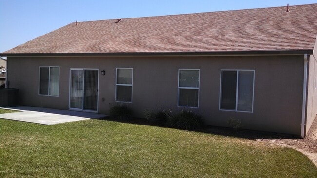 Building Photo - REDUCED!! Large Corner Lot Home with Landscaping included!