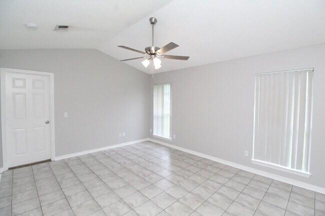 Building Photo - West Pensacola Brick Home with Vaulted Ceilings, Split Floor Plan, Open Living Design & Easy Acce...